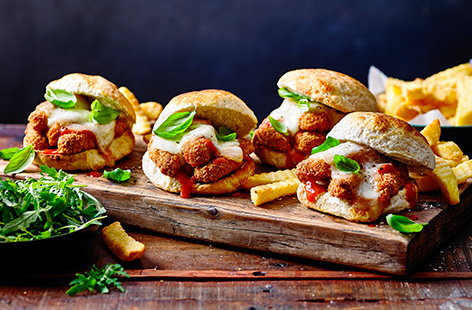 This indulgent but easy burger recipe is inspired by a classic Italian chicken parmigiana, but made simple for a Friday night treat! Pile up crispy chicken goujons with tomato sauce and plenty of melting mozzarella for a new twist on a chicken burger for dinner.